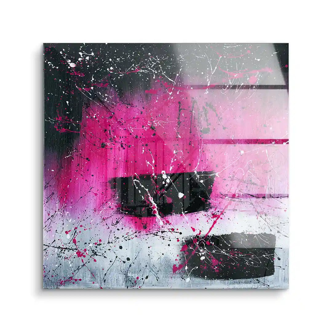 Abstraktes Wandbild mit pinken, schwarzen und weißen Farbspritzern auf Acrylglas