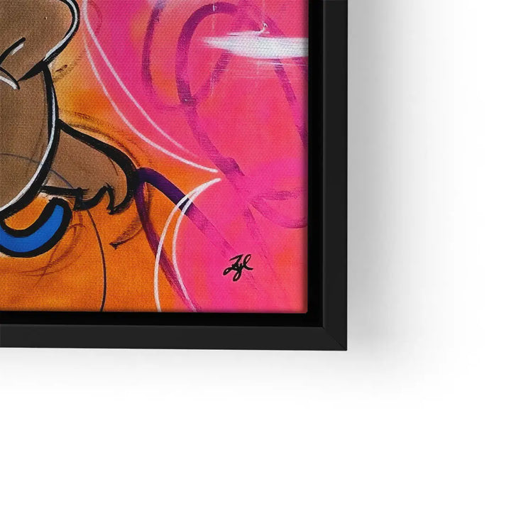 Detail eines modernen, farbenfrohen Wandbilds mit Comic-Elementen auf Leinwand im schwarzen Rahmen