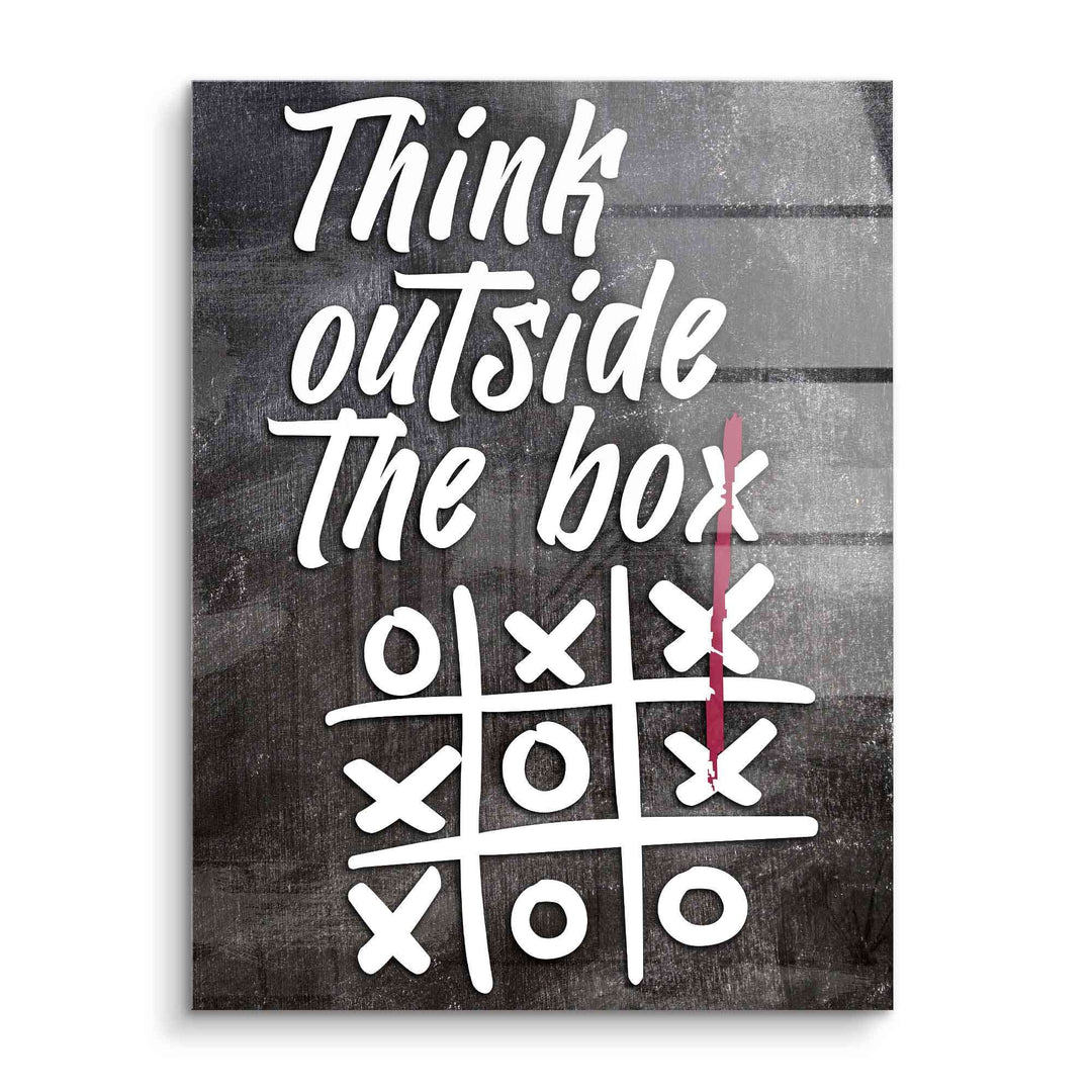 Modernes Acryl-Wandbild mit Spruch 'Think outside the box' und Tic-Tac-Toe-Motiv