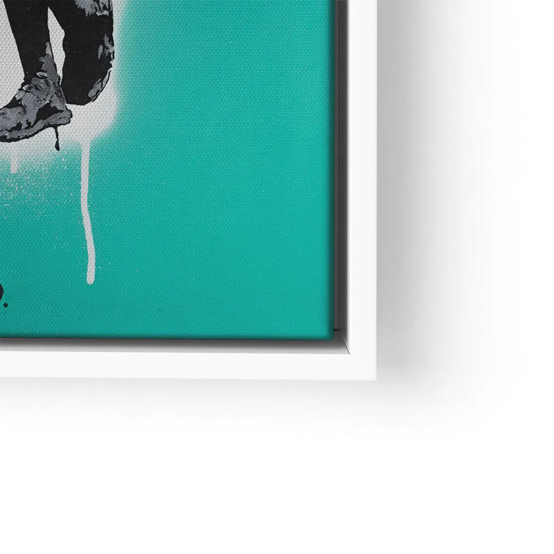 Modernes Wandbild mit schwarz-weißer Figur auf türkisem Hintergrund im weißen Rahmen
