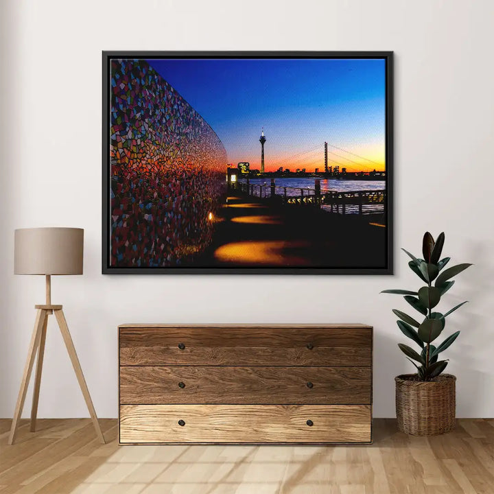 Modernes Wandbild mit farbenfroher Turm-Skyline bei Sonnenuntergang im Wohnzimmer