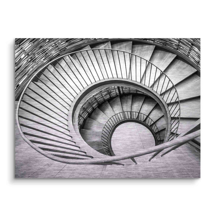 Schwarz-weiß Wandbild mit kunstvoller, spiralförmiger Wendeltreppe und moderner Architektur