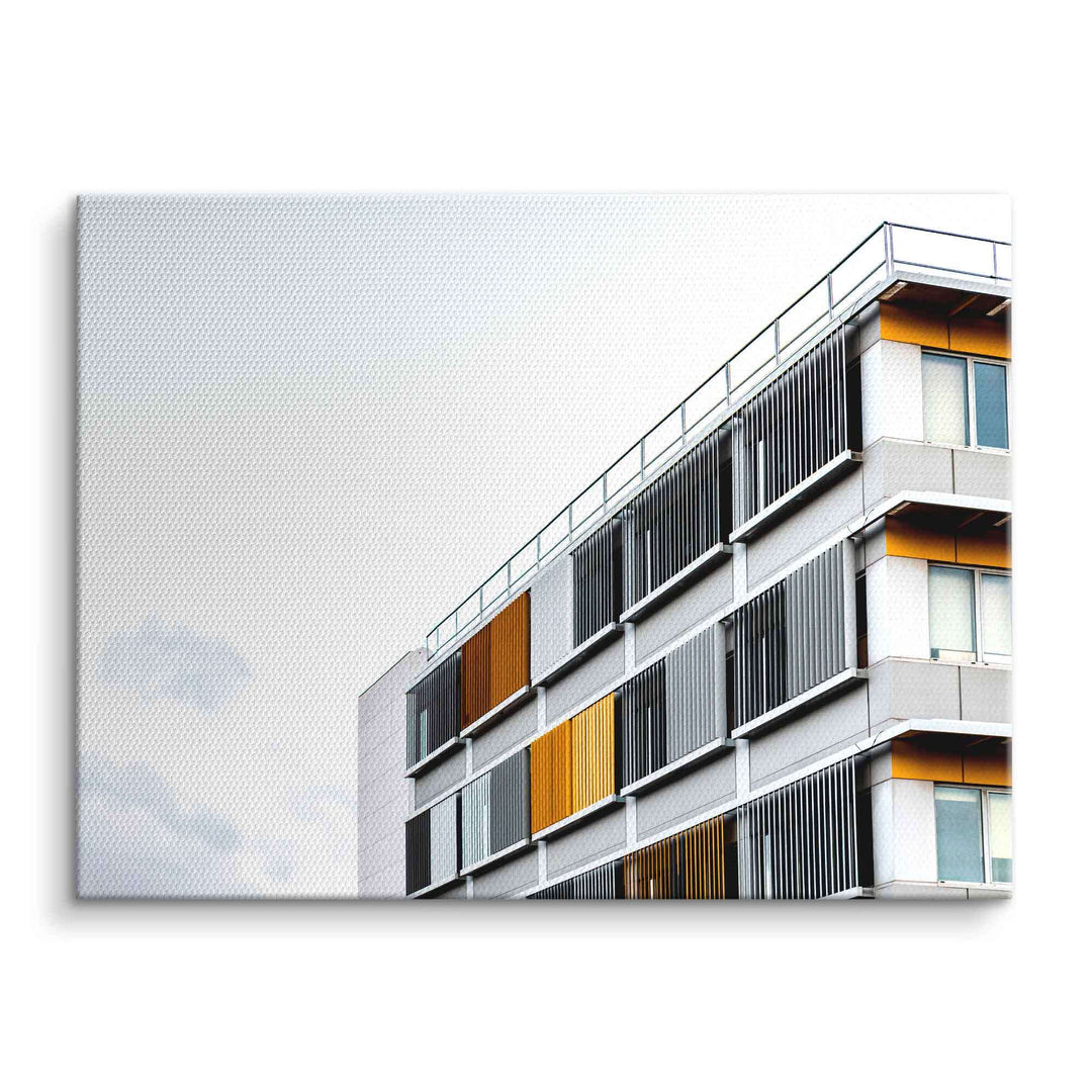 Modernes Wandbild mit abstrakter Architektur, Gebäude mit gelben und grauen Fassadenelementen